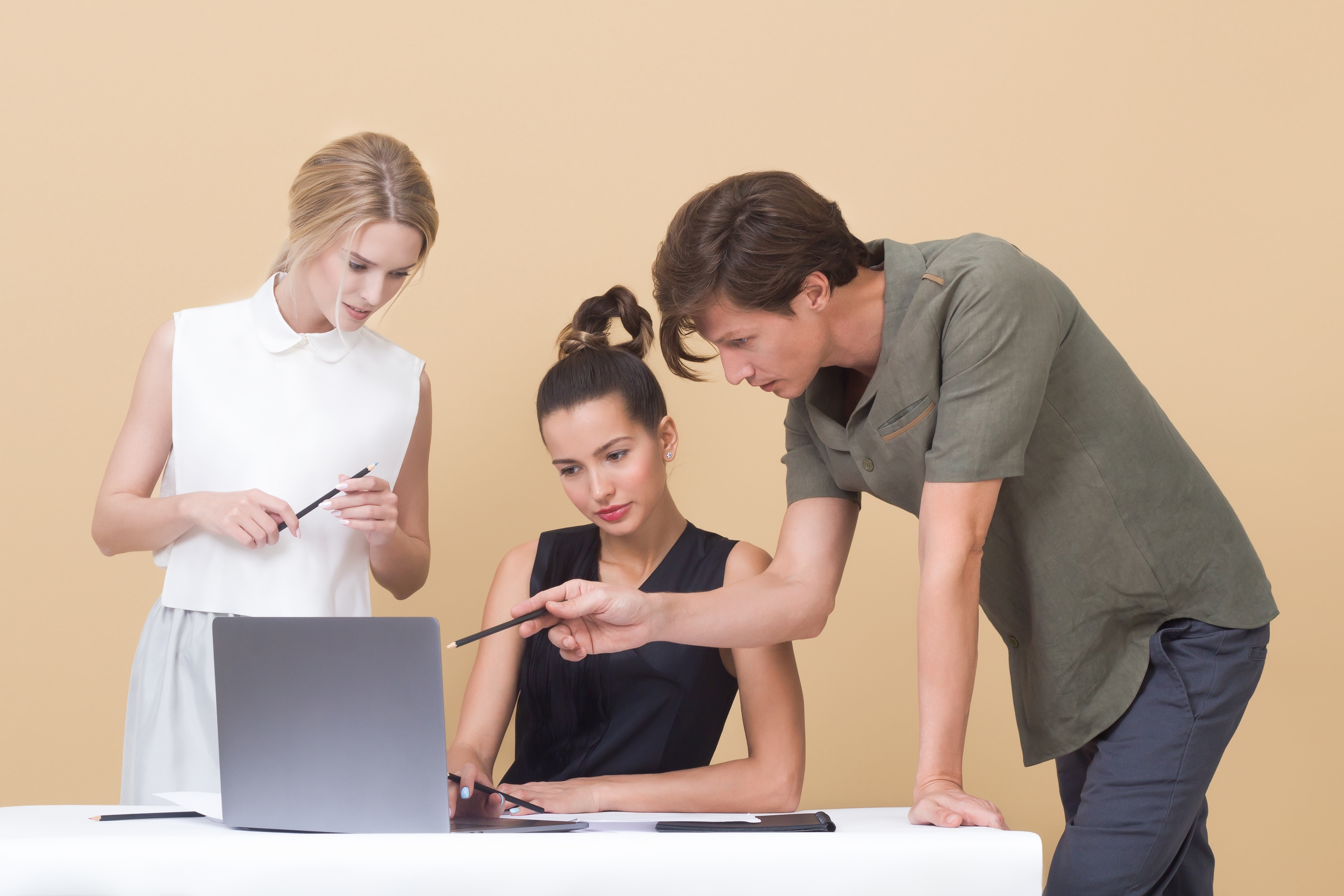 Colleagues looking at a computer